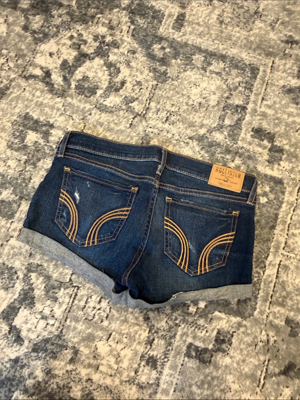 Hollister Dark Blue Denim Rolled Hem Shorts with Tan Stitching